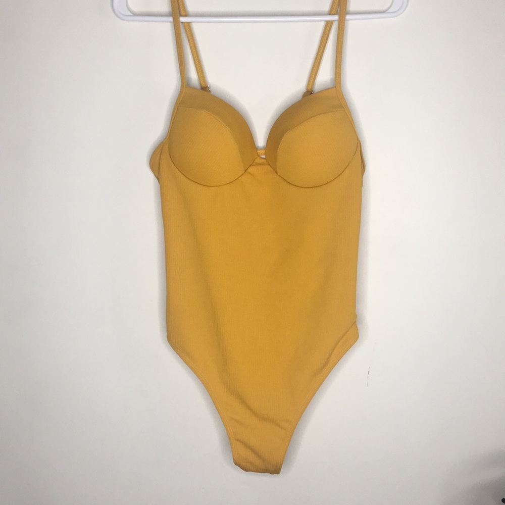 Yellow cheeky one piece bathing suit